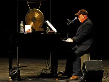 Students got a once-in-a-lifetime shot as The Piano Man takes the stage at intimate Durgin Hall to recall his career and the art of the song for a rapt student audience.