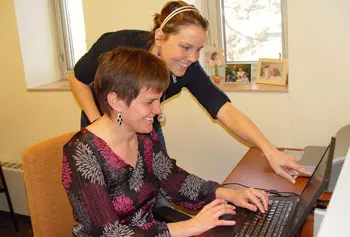 Sociology Prof. Mignon Duffy, left, and Analissa Iversen, a senior majoring in sociology, are analyzing the biographical narratives of winners on the popular television show &lsquo;American Idol.&rsquo;