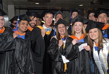 Bill Nye the Science Guy sports bowties with UMass Lowell graduates