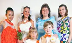 Art student Diane Shugrue, rear, third from left, sports a plastic mother of the groom dress in a lovely robin&rsquo;s egg blue.
