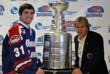 Sophomore goalie Doug Carr and official keeper of the cup Phil Pritchard.
