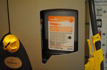 The new dispensing system for the green cleaning products is expected to reduce waste and save money.