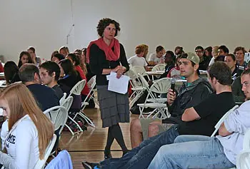 Biology Assoc. Prof. Juliette Rooney-Varga, standing, addresses the students during last year&rsquo;s Climate Change Teach-In.