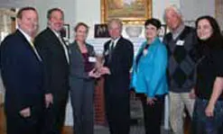 Shown at Allen House during the delegation's visit are, from left, Prof. Frank Talty, Prof. Stephen McCarthy, Mayor&nbsp;Cora Harvey, Chancellor Marty Meehan, Prof. Ann Marie Hurley, Jim O&rsquo;Brien of the Center for Irish Partnerships Advisory Board, and&nbsp;Victoria Drakoulakos, associate director of the Center for Irish Partnerships.
