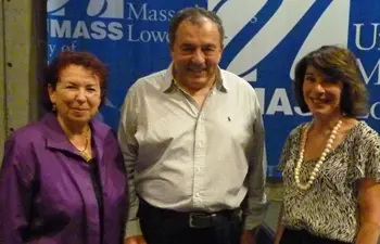 From left, Rivka and Zvi Eisikovits are welcomed by Prof. Eve Buzawa, chair of the Criminal Justice and Criminology Department. Eisikovits, on exchange from the University of Haifa, spoke about his research on intimate partner violence.
