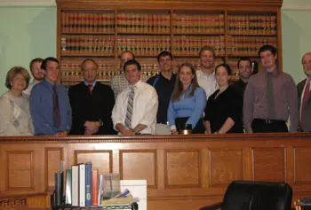 Asst. Prof. Pat Fontaine and her class with Superior Court Judge John Lu at Superior Courthouse in Lowell.