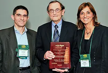 Prof. Nathan Gartner, center, with M. Grazia Speranza, chair of the Robert Herman Award Committee, and Patrick Jaillet, president of the Transportation Science and Logistics Society and former chair of the Civil Engineering Department at MIT, in Charlotte, N.C., in November.