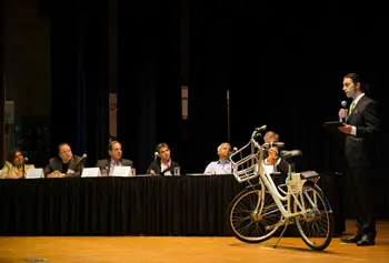 Samir ElKamouny, a 2012 graduate of the Manning School of Business, makes his pitch for funding for a bike-sharing venture at the Merrimack Valley Sandbox Showdown Pitch competition.