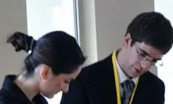 Geoffrey Magee, representing Russia, negotiates with a Turkish student representing the UK to form an alliance.
