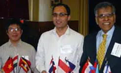 Tuan Do, left, doctoral student in work environment from Vietnam, and Ramraj Gautam, visiting lecturer in nursing from Nepal, join Krishna Vedula at a forum on international partnerships.