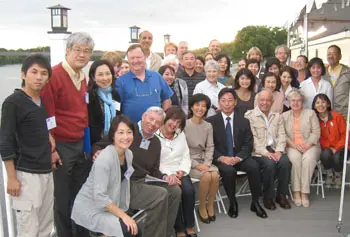 JUSTEC attendees, including Provost Ahmed Abdelal (front, third from right), Boston Consul General of Japan Takeshi Hikihara and his wife to the right (front, center) and Donald Pierson (front, second from left) enjoyed a visit to the Bellegarde Boathouse during the &nbsp;conference.