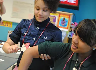 Lawrence High School students participate in a nursing workshop. Nursing received a $996,584 grant to recruit, retain and graduate nurses from diverse backgrounds.