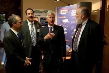 From left, Jay Gonzalez, Massachusetts secretary of administration and finance; Prof. Stephen McCarthy, co-director of M2D2; UMass Lowell Chancellor Marty Meehan and David MacKenzie, executive director of the UMass Building Authority, at the opening event.