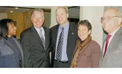 Israeli Consul General Nadav Tamir, center, is welcomed to UMass Lowell by, from left, UMass Vice President Marcellette Williams, Chancellor Marty Meehan, Prof. Paula Rayman and Provost Ahmed Abdelal.