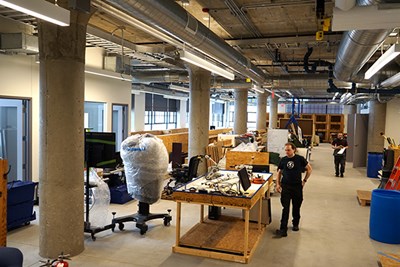 Workers set up a lab at TURI's new location  