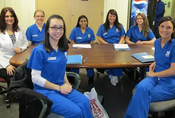 In the back, from left, faculty lecturer Lea Dodge with students Sara Pietila, Shama Billmoria, Kristiana Demers and Kelly Brawley; front, from left, Mariana DeLazerda and Meagan Gillis.