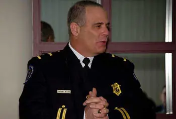 Frederick Williams, the Univeristy's first police chaplain, speaks at a police department awards ceremony.