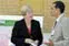 Asst. Prof. Ram Nagarajan talks to state Sen. Eileen Donoghue about his research on greener substances for everyday products.