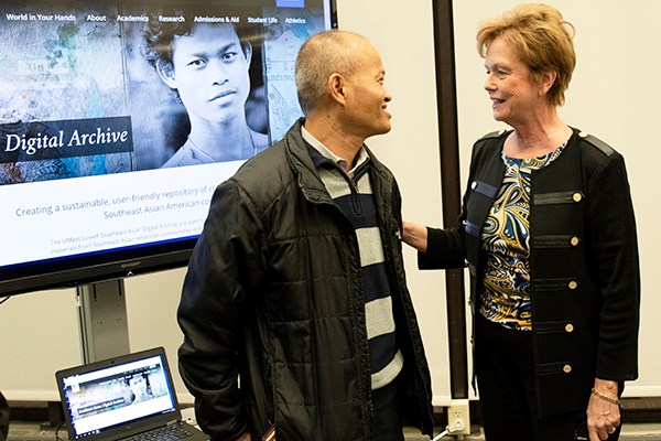 UMass Lowell Chancellor Jacquie Moloney spoke with Tim Thou, co-founder of the Angkor Dance Troupe, at the launch of the Southeast Asian Digital Archive