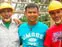 Volunteers celebrate completing the framework, as they build new houses for poor families in rural Cambodia. Directed by student Tola N. Sok, Project Save One Khmer built six houses in nine days.