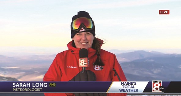 Sarah Long broadcasting from atop Mt. Washington