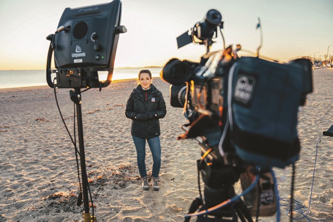 Shiri Spear broadcasts from the beach