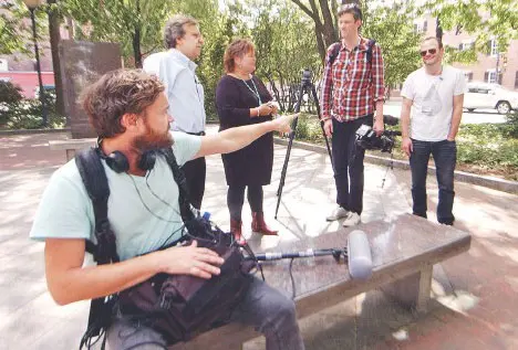 A UK Travel Channel video crew visited Lowell on Thursday in Kerouac Park. From left are UK Travel Channel's Ian Hart, Kerouac expert Paul Marion, Greater Merrimack Valley Convention & Visitors Bureau President Deb Belanger, director Justin Hawkes and host Julian Hanton.