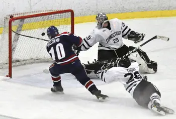 David Vallorani scored his 100th goal during the UConn Toyota Holiday Classic and this winning shot against the host school. Photo by Bob Ellis.