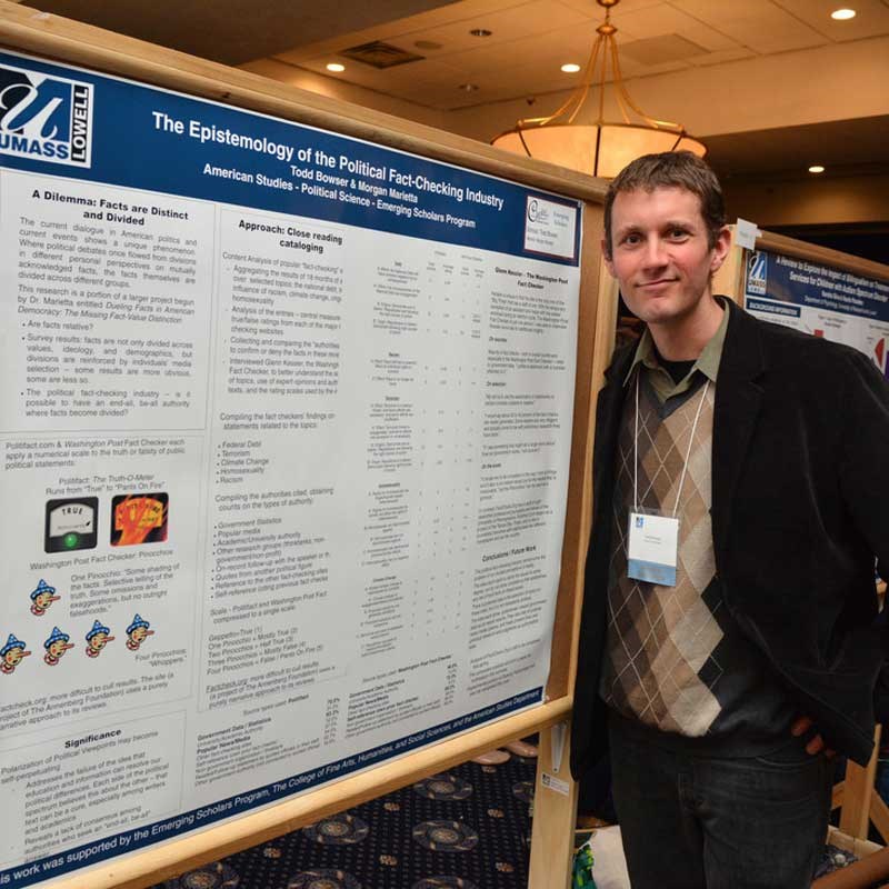 Todd Bowser (American Studies) presents his poster at the Student Research Symposium.