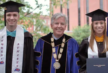 Senior Angus MacDonald, Chancellor Marty Meehan and Senior Ashley Zielinski