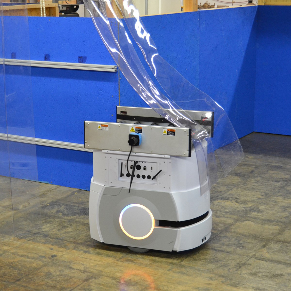 Omron Adept Lynx robot navigates through a test apparatus for soft partitions.