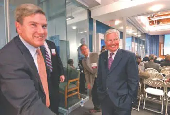 Greg Bialecki, left, the state's secretary of Housing and Economic Development, visited the Wannalancit Mill in Lowell last night to discuss the state's strategic plan for economic development. Greeting him is UMass Lowell Chancellor Marty Meehan. The event, co-sponsored by the Merrimack Valley Venture Forum and the Massachusetts Medical Device Development Center, was attended by about 100 medical-device entrepreneurs and economic development officials.