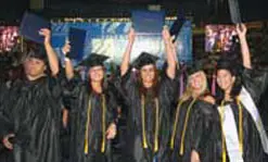 Graduates celebrate at Commencement 2010. This year's class will be even larger.