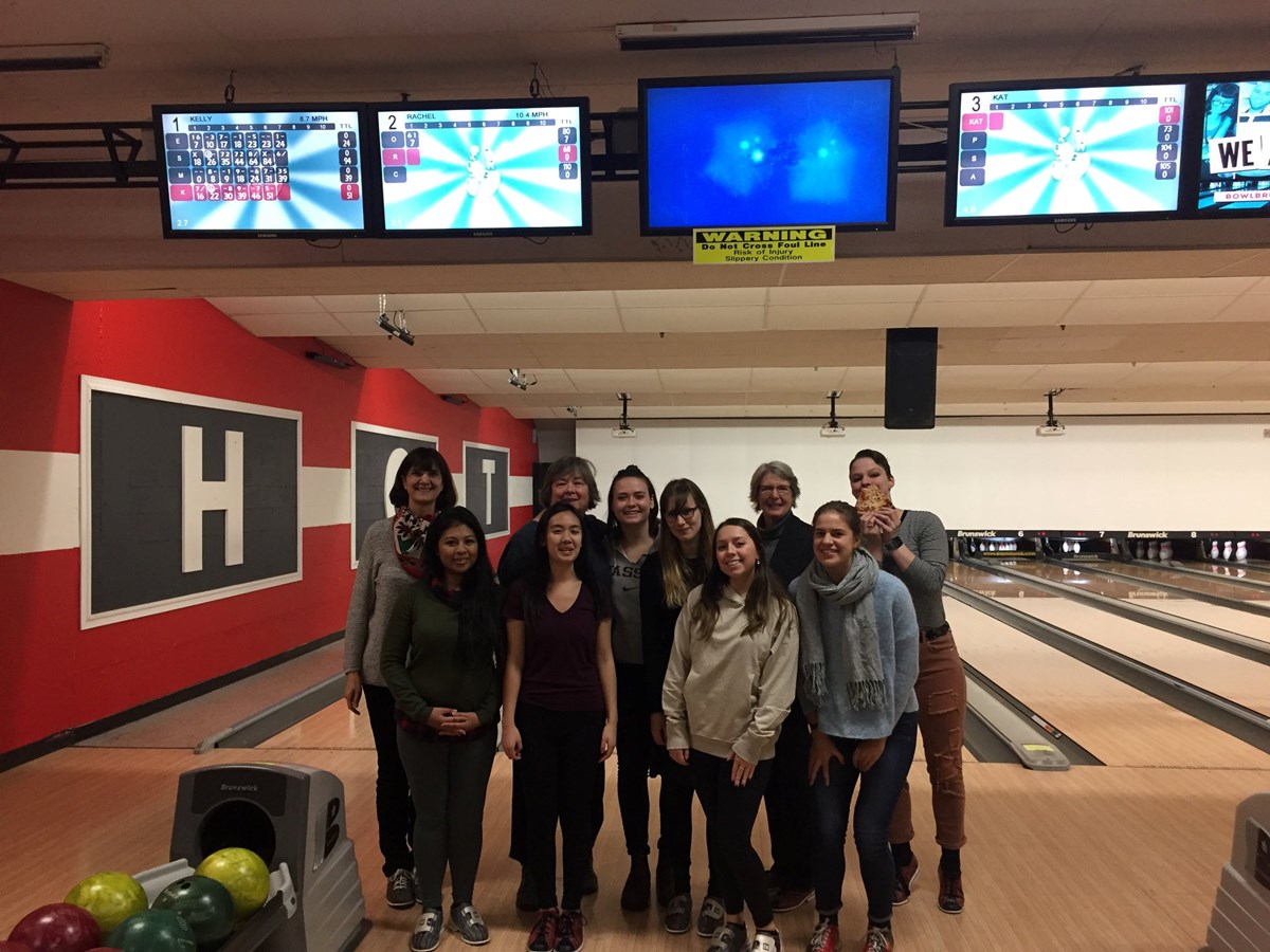 In this picture are a group of female professors and students in the department. They had a bowling game as one "women in economics" event. 
