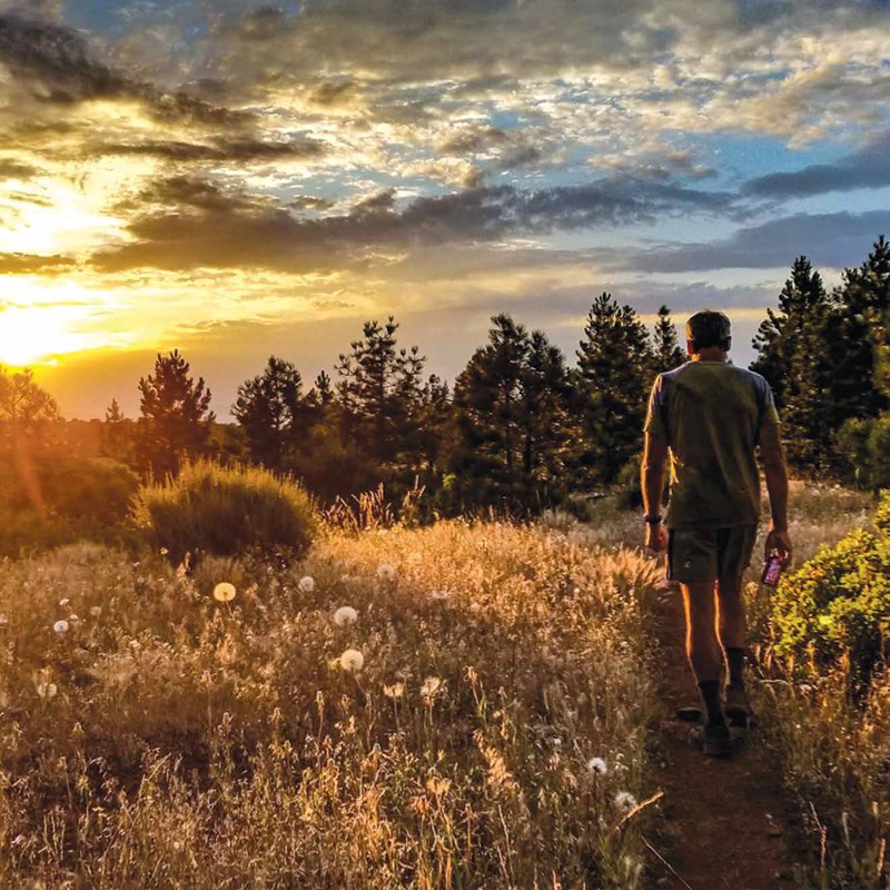 A sunset shot of Kyle Soeltz ’14 hiking the Pacific Crest Trail