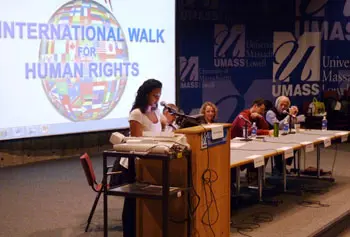 International student ambassador Marcela Linares introduces faculty panelists at the Human Rights Forum, part of the campus&rsquo; International Education Week program.