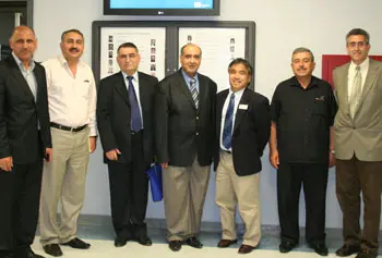 Engineering Dean John Ting, third from right, and Rachid Hankour of Geocomp Corp., far right, with the Iraqi delegation.