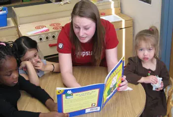 UMass Lowell students participating in the Jumpstart program are working with preschoolers at the Children's Corner preschool in Lowell on literacy skills.