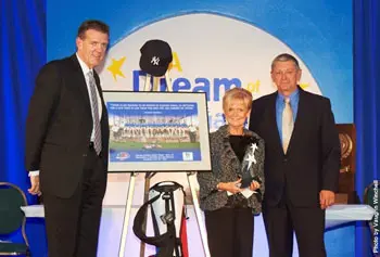 Director of Athletics Dana Skinner alongside Sally Mucica and Bill Mucica, who accepted the James T. Smith Award presented posthumously to Gary Mucica. Photo by Vaughn Winchell.
