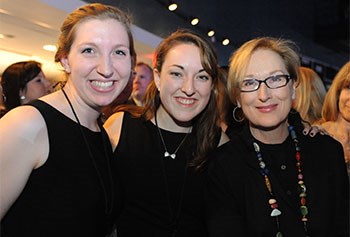 UMass Lowell students Janice Lane and Maddie Koufogazos with Meryl Streep