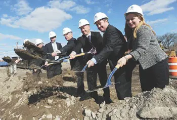 UMass Lowell and city officials break ground on new dorms across from LeLacheur Park in Lowell yesterday. From left are President and CEO of Walsh Bros. Inc., Richard Walsh; Mayor Patrick Murphy; UML Chancellor Marty Meehan; state Rep. Thomas Golden; President of Mass Trades Frank Callahan and Executive Director of UMass Building Authority Katherine Craven.&nbsp;