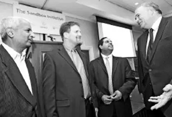 Desh Deshpande, far left, meets with local leaders at a Merrimack Valley Sandbox event yesterday. From left are Deshpande, Sandbox Executive Director Todd Fry, Director of Innovation and Entrepreneurship Nish Acharya, and keynote speaker and president of Harrow College, Tony Medhurst.