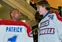 Junior Josh Holmstrom presents Gov. Deval Patrick with a UMass Lowell home jersey. Bob Ellis photo