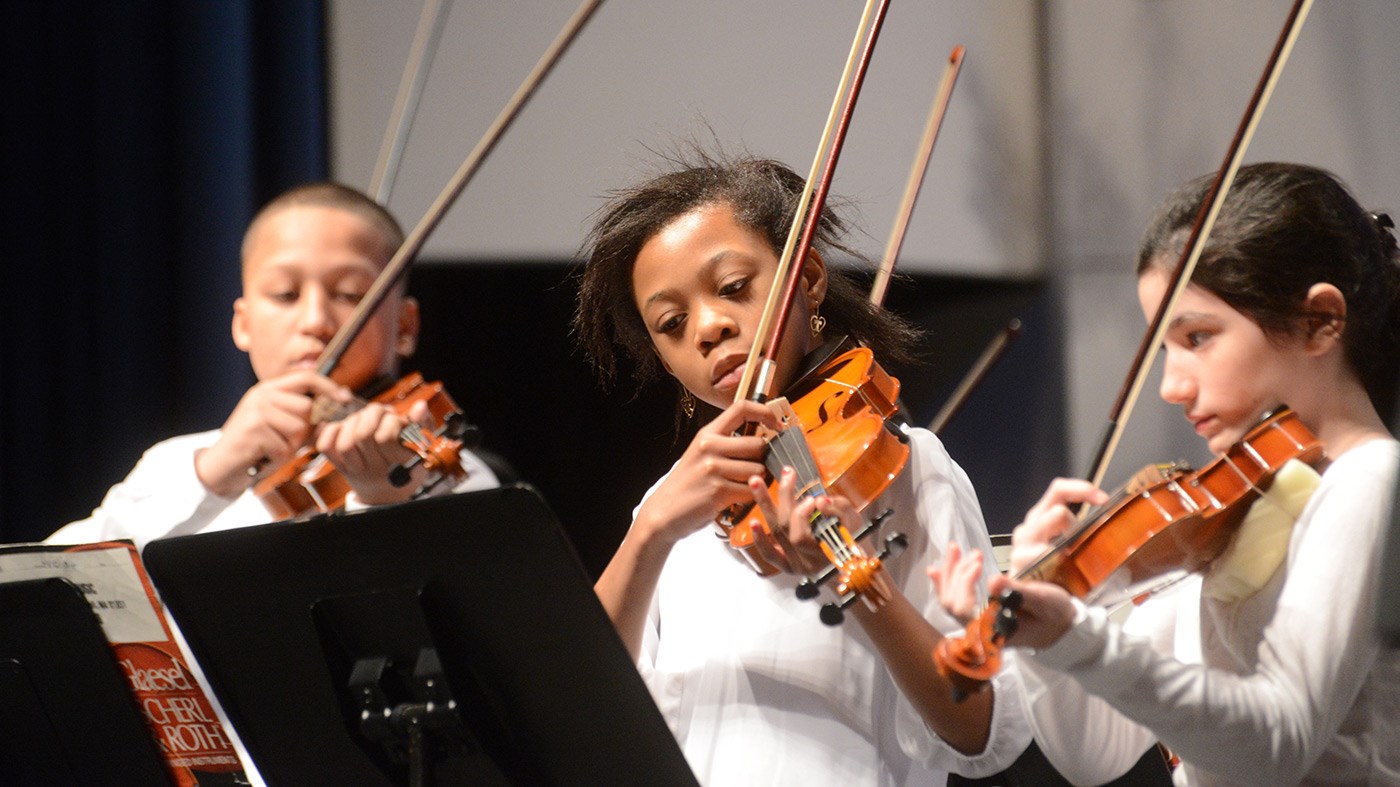 Young musicians perform at the String Project Winter Holiday Concert