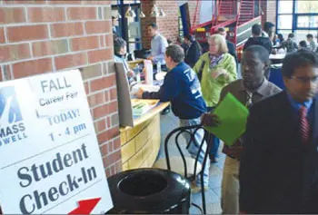 Students and prospective workers filter in to UMass Lowell s campus Recreation Center on Wednesday for a massive job fair.