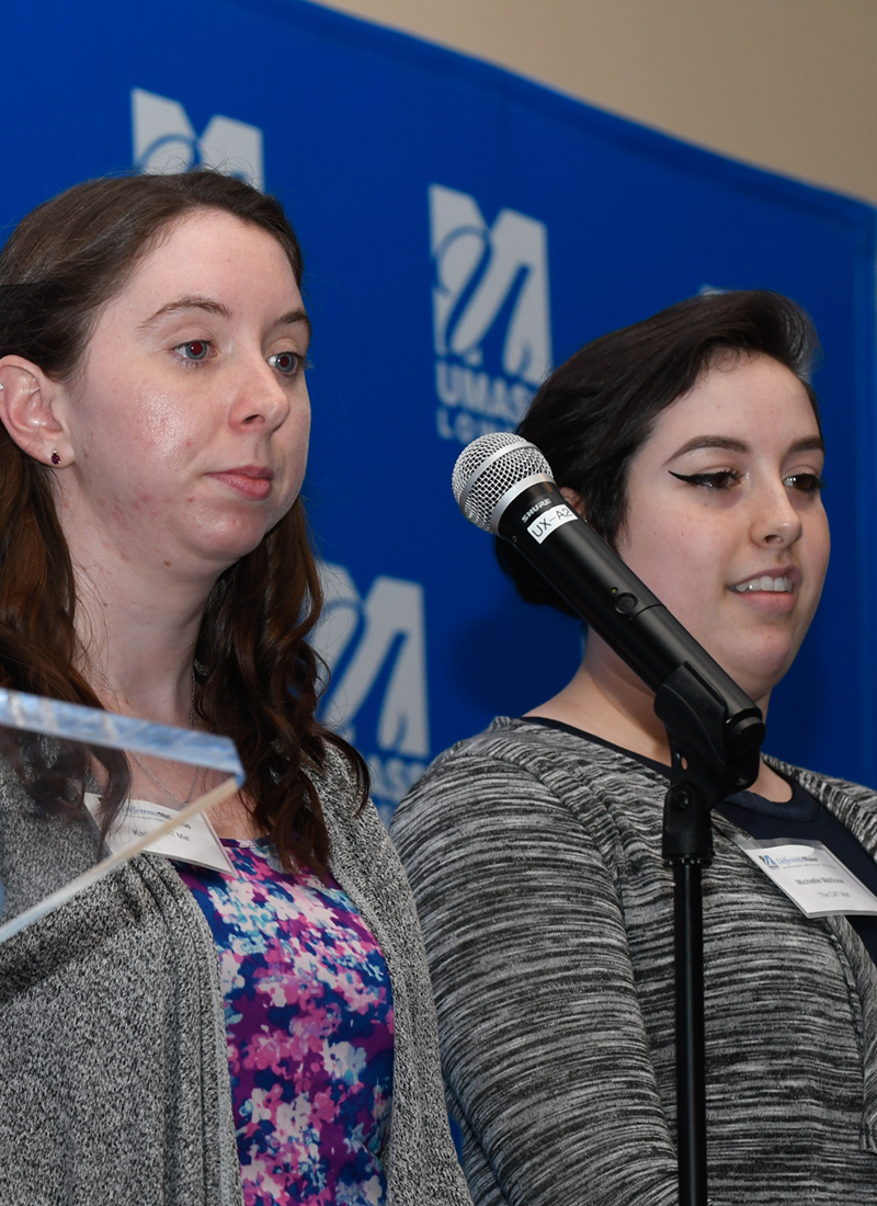 CAT Mat team members Michelle Mailloux and Katherine Muise present onstage at DifferenceMaker