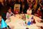 Girls Inc., a partner with UMass Lowell for "Dickens in Lowell," celebrated the author's 200th birthday with Victorian parlor games at the Inn & Conference Center.