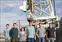 Asst. Prof. Timothy Cook, fourth from left, poses with his team at the White Sands Missile Range in New Mexico: Ewan Douglas, Brian Hicks, Meredith Danowski and Chris Mendillo and Jason Martel.
