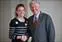 Chancellor Marty Meehan congratulates student Megan Lewis for spearheading the Ex-Smokers Hall of Fame project that aims to encourage people to kick the habit.