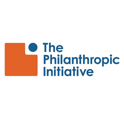 The Philanthropic Initiative logo - those words with an orange and blue geometric design to the left of the words.